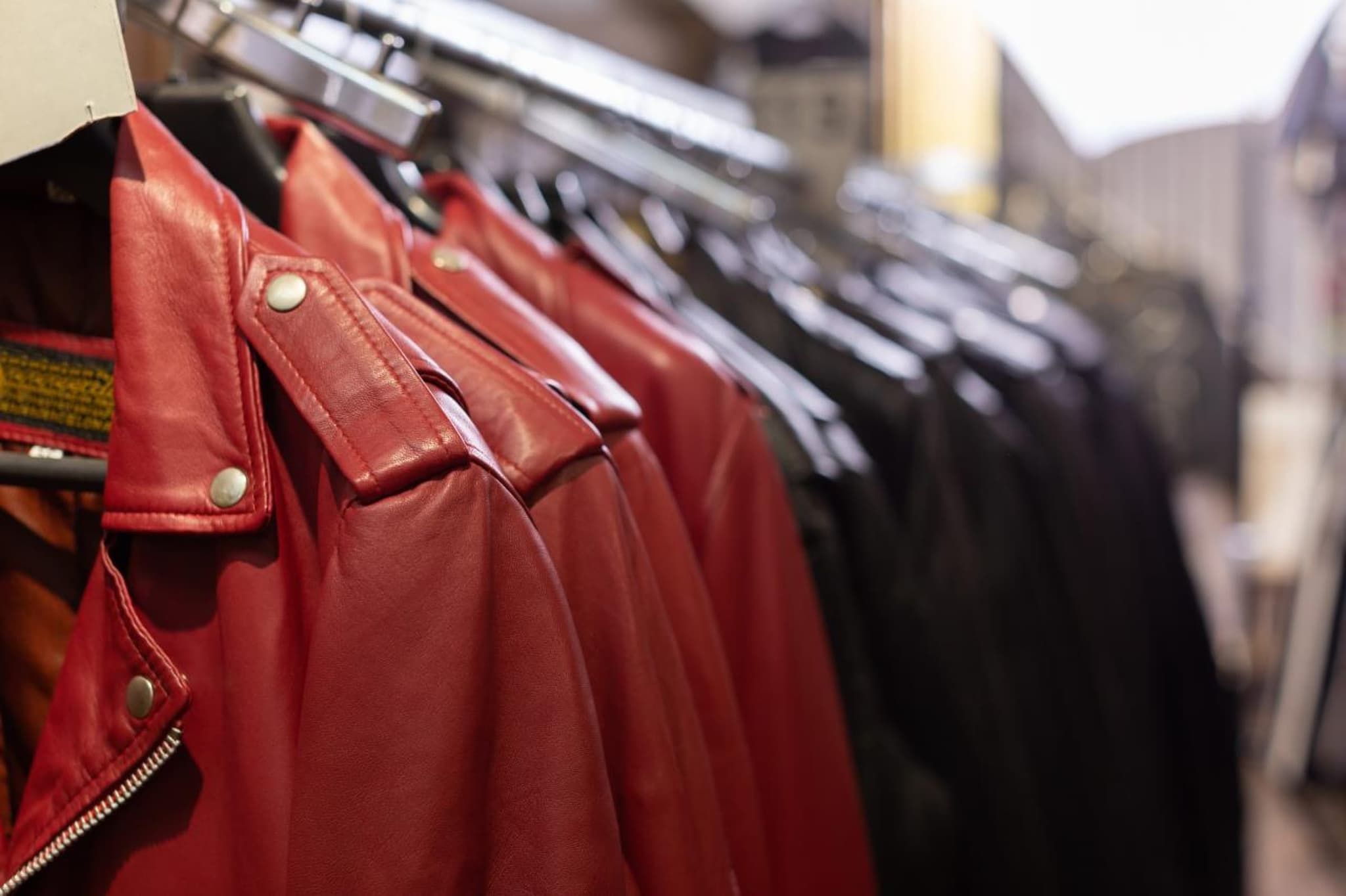 Leather jackets on a rail at the Ace of Suedes workshop
