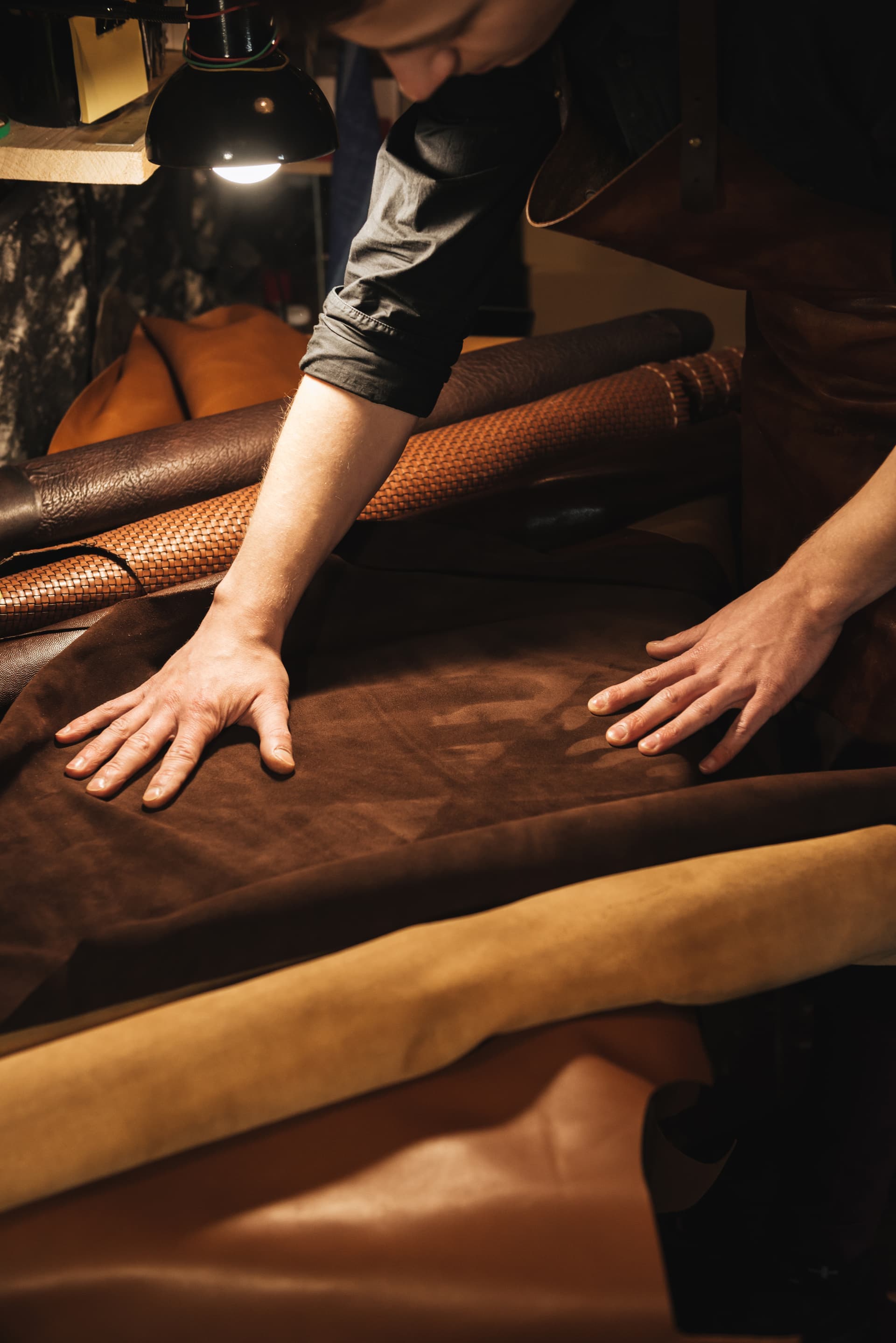 Specialist craftsman at work in the Ace of Suedes workshop